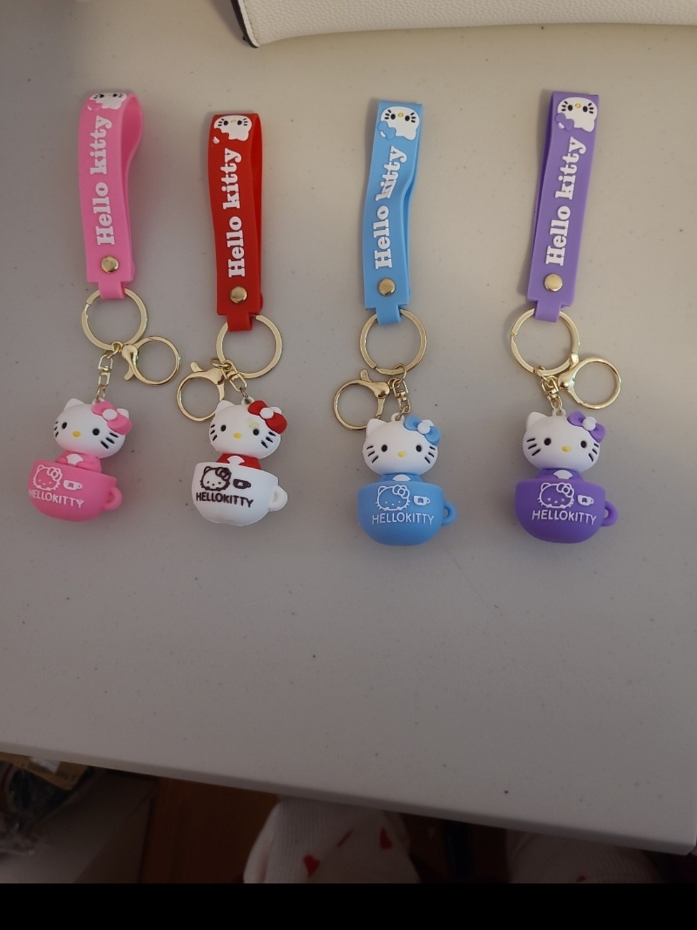 Hello Kitty Silicone Cup Keychain Set - Pink, Red, Blue, Purple